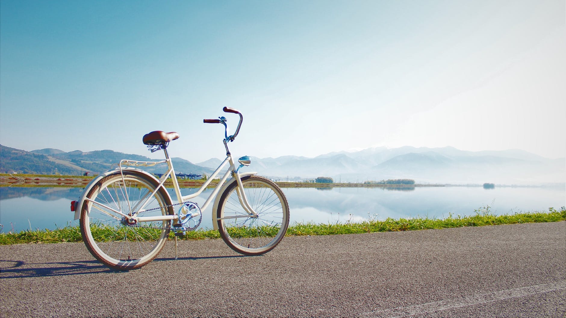 Bicycle on a road near a shore line